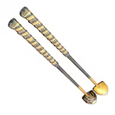 Two decorative park golf clubs with gold and black patterns on a white background
